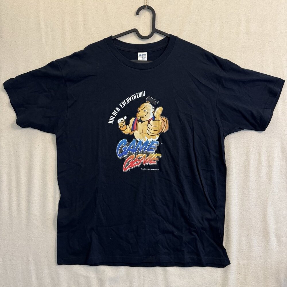 Unlock Everything! Game Genie 2012 Promo T-Shirt Nintendo Sega Playstation XL